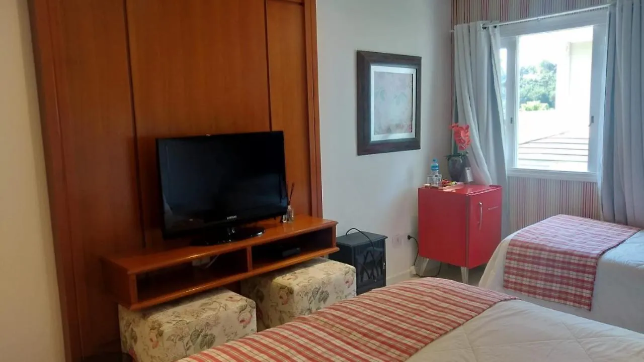 Vila De Charme Suites Campos do Jordao Guest house
