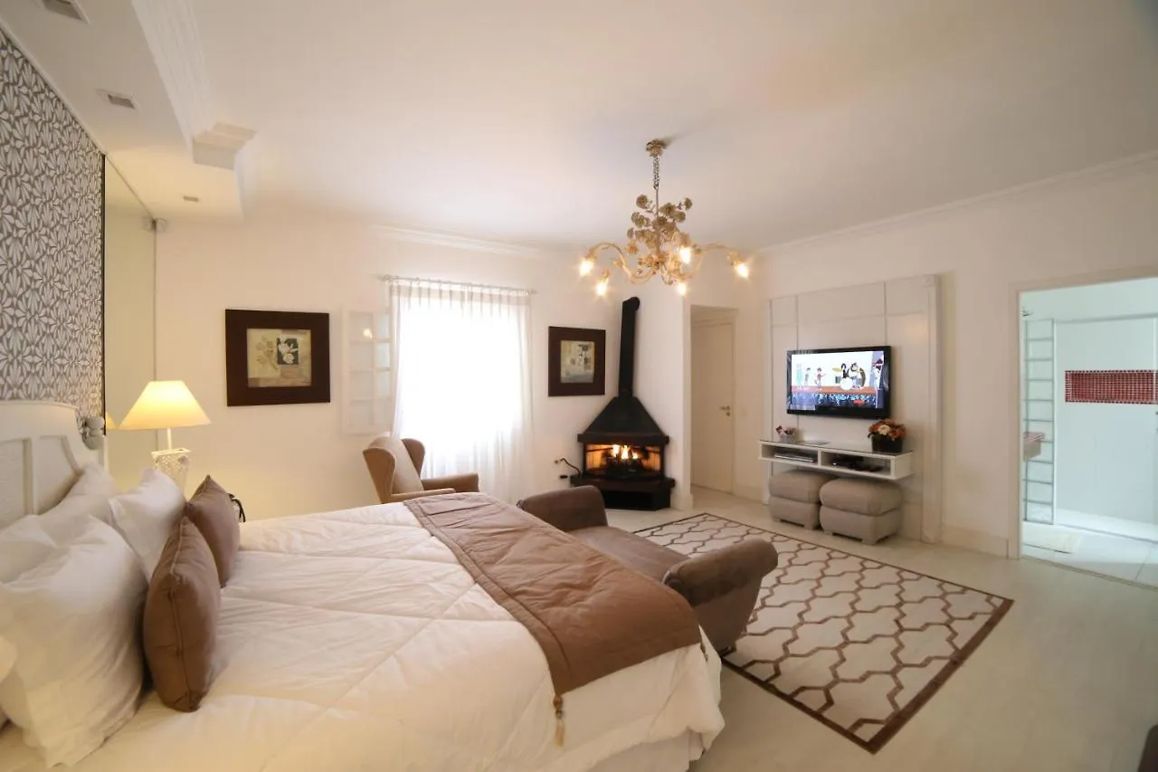 Guest house Vila De Charme Suites Campos do Jordao