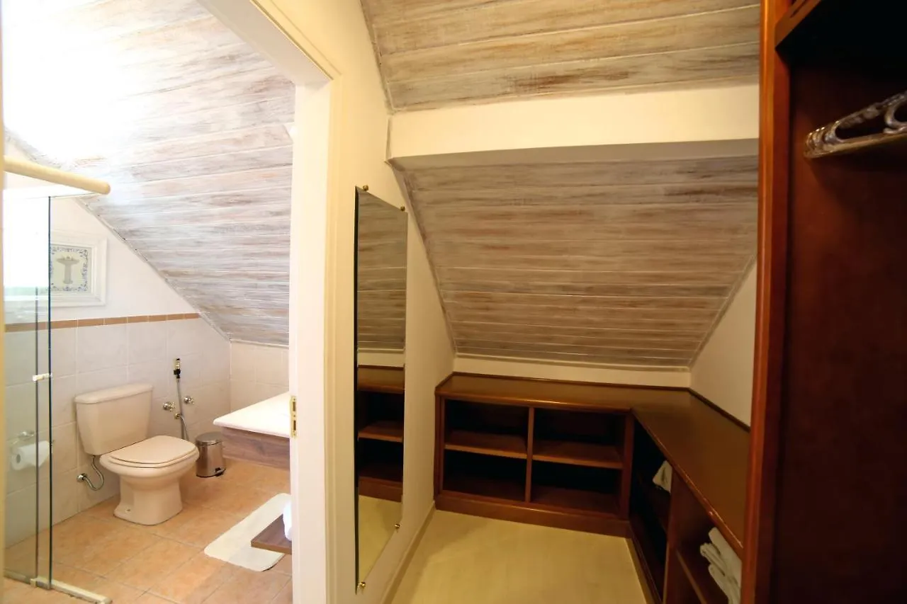Vila De Charme Suites Campos do Jordao Guest house